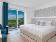 Two nights in the Superior Room of the In Excelsis Hotel with a relaxing massage